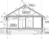 Przekrój poprzeczny budynku z detalami izolacji i konstrukcji. Projekt architektoniczno budowlany przedstawia warstwy ścian, dachu i fundamentów.