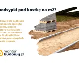 Słuchy beton pod kostkę proporcje: stosy kostki brukowej na paletach, przygotowany podkład piaskowy i obrzeża.