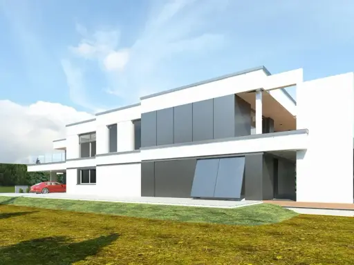 Nowoczesne projekty bliźniaków do 100m2. Biały dom z szarymi panelami, czerwony samochód pod wiatą.