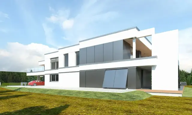 Nowoczesne projekty bliźniaków do 100m2. Biały dom z szarymi panelami, czerwony samochód pod wiatą.